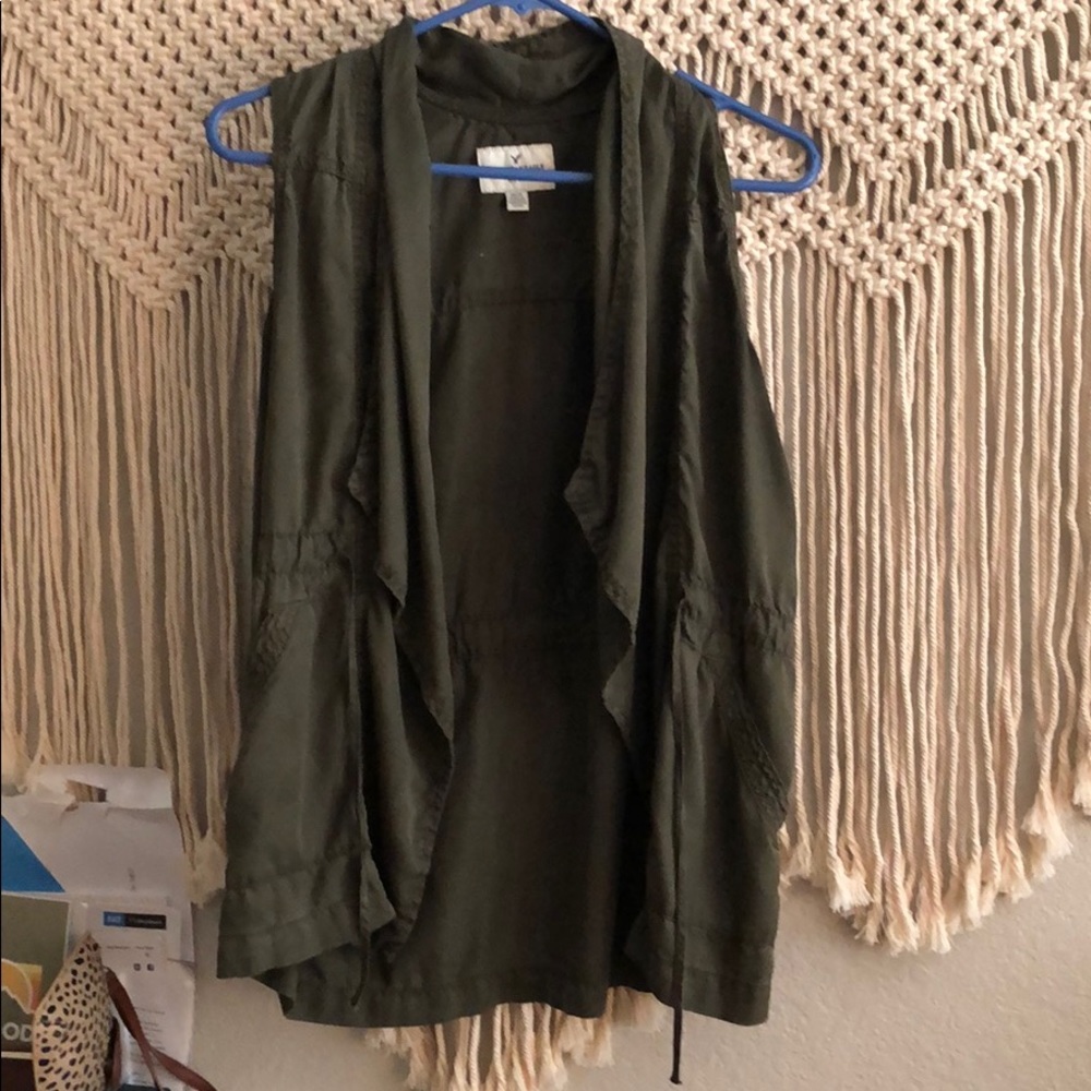 This is an army green summer vest
